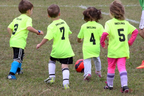 Julia dribbles the ball